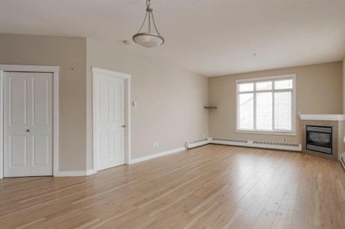 204-100 Denholm Gate, Fort Mcmurray, AB - Indoor With Fireplace