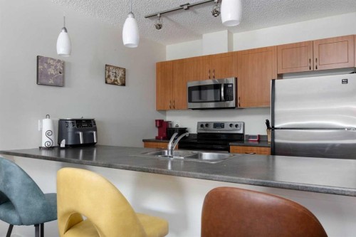 302-136A Sandpiper Road, Fort Mcmurray, AB - Indoor Photo Showing Kitchen With Double Sink