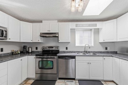 189 Caouette Crescent, Fort Mcmurray, AB - Indoor Photo Showing Kitchen With Stainless Steel Kitchen With Double Sink