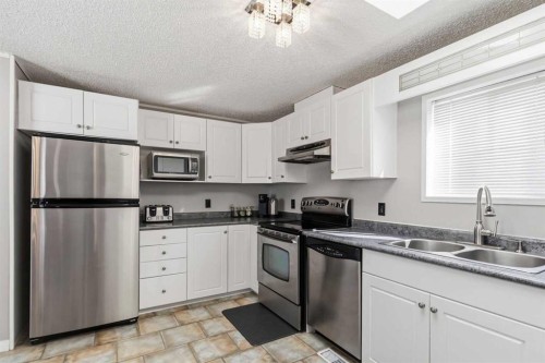 189 Caouette Crescent, Fort Mcmurray, AB - Indoor Photo Showing Kitchen With Stainless Steel Kitchen With Double Sink
