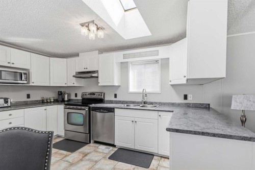 189 Caouette Crescent, Fort Mcmurray, AB - Indoor Photo Showing Kitchen With Stainless Steel Kitchen With Double Sink