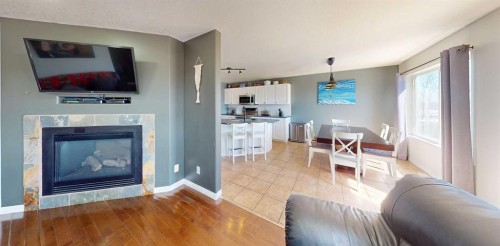 9221 91 Ave, Lac La Biche, AB - Indoor Photo Showing Living Room With Fireplace