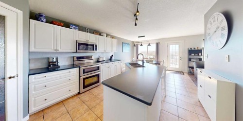 9221 91 Ave, Lac La Biche, AB - Indoor Photo Showing Kitchen With Double Sink