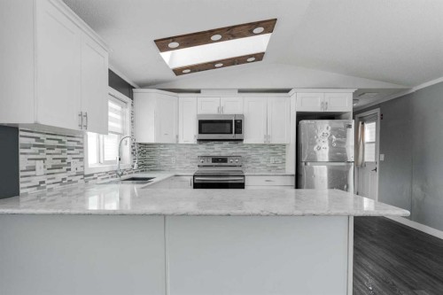 216 Harpe Way, Fort Mcmurray, AB - Indoor Photo Showing Kitchen With Upgraded Kitchen