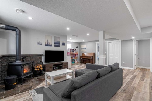459 Killdeer Way, Fort Mcmurray, AB - Indoor Photo Showing Living Room With Fireplace