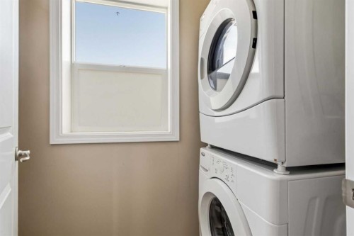 93-313 Millennium Drive, Fort Mcmurray, AB - Indoor Photo Showing Laundry Room