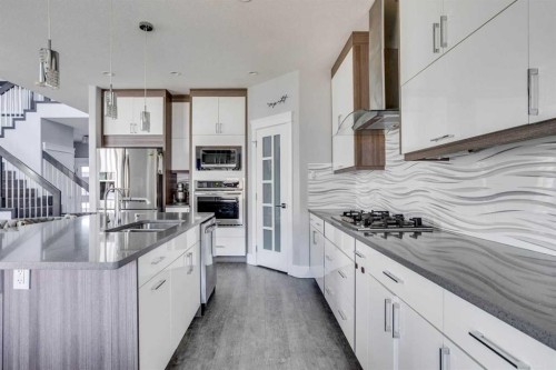218 Prospect Drive, Fort Mcmurray, AB - Indoor Photo Showing Kitchen With Stainless Steel Kitchen With Double Sink With Upgraded Kitchen
