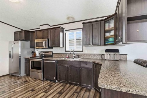 140 Ewashko Crescent, Fort Mcmurray, AB - Indoor Photo Showing Kitchen With Stainless Steel Kitchen With Double Sink