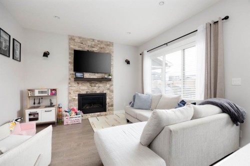 115 Athabasca Crescent, Fort Mcmurray, AB - Indoor Photo Showing Living Room With Fireplace