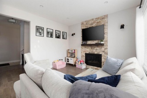 115 Athabasca Crescent, Fort Mcmurray, AB - Indoor Photo Showing Living Room With Fireplace