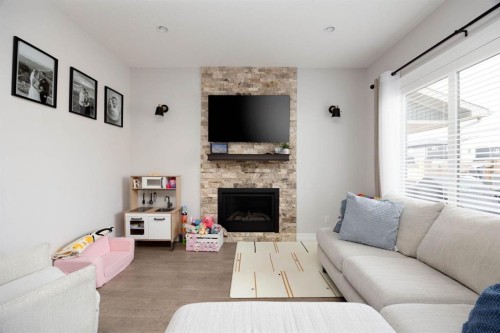 115 Athabasca Crescent, Fort Mcmurray, AB - Indoor Photo Showing Living Room With Fireplace
