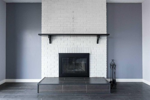 145 Robin Crescent, Fort Mcmurray, AB - Indoor Photo Showing Living Room With Fireplace