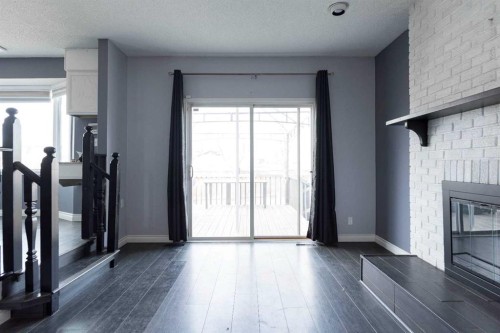 145 Robin Crescent, Fort Mcmurray, AB - Indoor Photo Showing Other Room With Fireplace