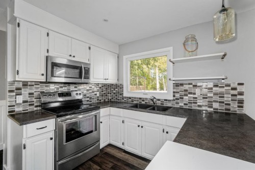 7 May Crescent, Fort Mcmurray, AB - Indoor Photo Showing Kitchen With Double Sink