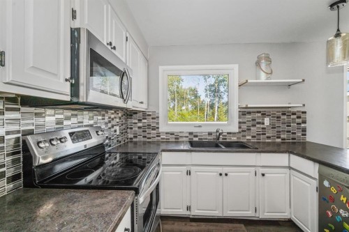 7 May Crescent, Fort Mcmurray, AB - Indoor Photo Showing Kitchen With Double Sink