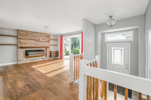 7 May Crescent, Fort Mcmurray, AB - Indoor Photo Showing Other Room With Fireplace