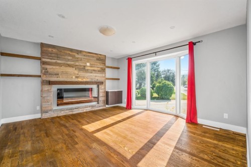 7 May Crescent, Fort Mcmurray, AB - Indoor Photo Showing Living Room With Fireplace