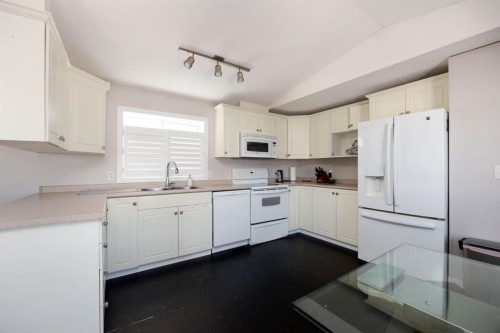 144 Mitchell Drive, Fort Mcmurray, AB - Indoor Photo Showing Kitchen With Double Sink