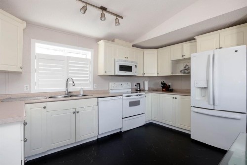 144 Mitchell Drive, Fort Mcmurray, AB - Indoor Photo Showing Kitchen With Double Sink