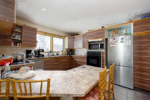 112 Hill Drive, Fort Mcmurray, AB - Indoor Photo Showing Kitchen With Double Sink