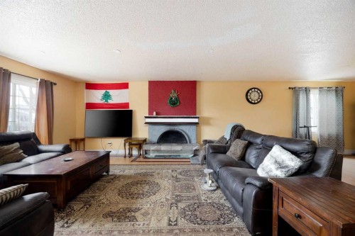 112 Hill Drive, Fort Mcmurray, AB - Indoor Photo Showing Living Room With Fireplace