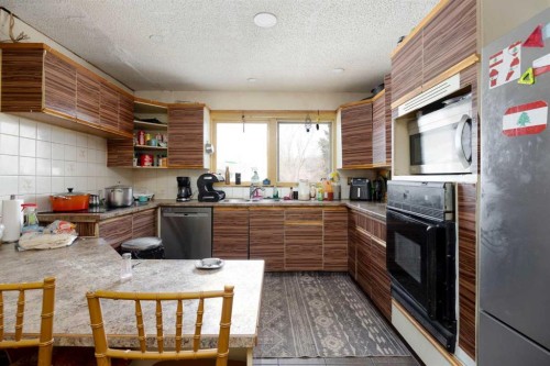 112 Hill Drive, Fort Mcmurray, AB - Indoor Photo Showing Kitchen With Double Sink
