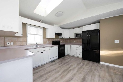 157 Cree Road, Fort Mcmurray, AB - Indoor Photo Showing Kitchen With Double Sink