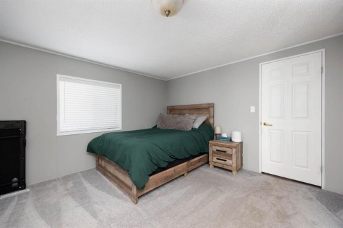 177 Couture Lane, Fort Mcmurray, AB - Indoor Photo Showing Bedroom