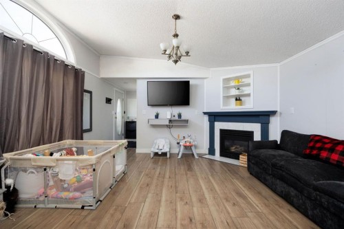 177 Couture Lane, Fort Mcmurray, AB - Indoor Photo Showing Living Room With Fireplace