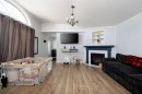 177 Couture Lane, Fort Mcmurray, AB  - Indoor Photo Showing Living Room With Fireplace 