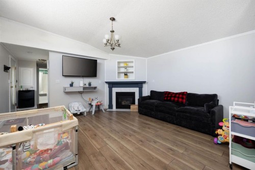 177 Couture Lane, Fort Mcmurray, AB - Indoor Photo Showing Living Room With Fireplace