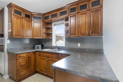 23 Clark Crescent, Fort Mcmurray, AB - Indoor Photo Showing Kitchen With Double Sink