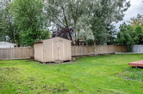 150 Leigh Crescent, Fort Mcmurray, AB - Outdoor With Backyard