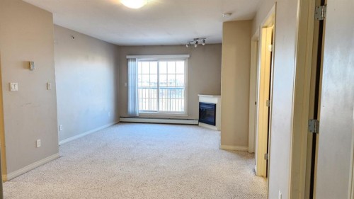 1411-200 Lougheed Drive, Fort Mcmurray, AB - Indoor With Fireplace