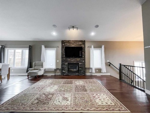 260 Killdeer Way, Fort Mcmurray, AB - Indoor Photo Showing Living Room With Fireplace
