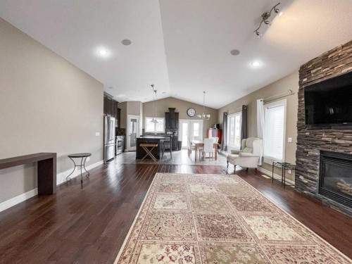 260 Killdeer Way, Fort Mcmurray, AB - Indoor Photo Showing Living Room With Fireplace