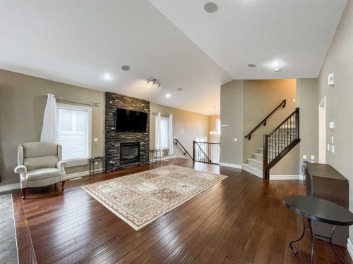 260 Killdeer Way, Fort Mcmurray, AB - Indoor Photo Showing Living Room With Fireplace