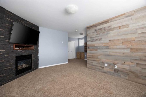 150 Pacific Crescent, Fort Mcmurray, AB - Indoor With Fireplace