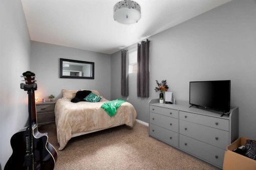 150 Pacific Crescent, Fort Mcmurray, AB - Indoor Photo Showing Bedroom