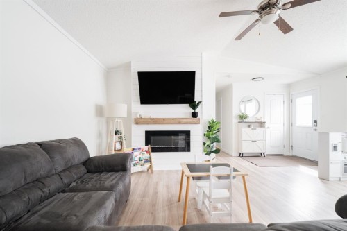 280 Caouette Crescent, Fort Mcmurray, AB - Indoor Photo Showing Living Room With Fireplace