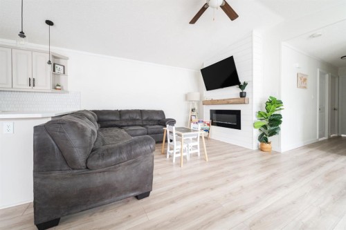 280 Caouette Crescent, Fort Mcmurray, AB - Indoor Photo Showing Living Room With Fireplace