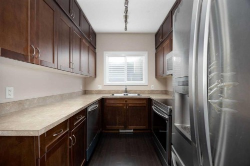 225 Sparrow Hawk Drive, Fort Mcmurray, AB - Indoor Photo Showing Kitchen With Double Sink