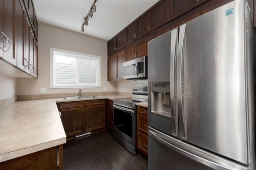 225 Sparrow Hawk Drive, Fort Mcmurray, AB - Indoor Photo Showing Kitchen With Double Sink