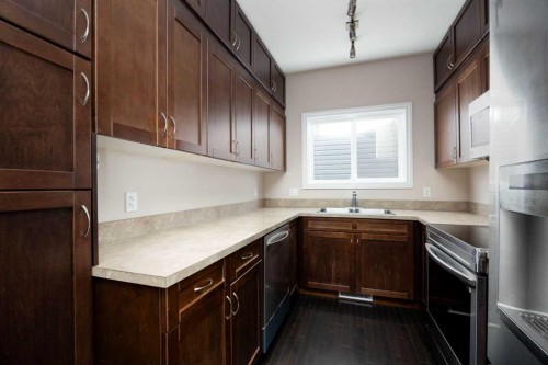 225 Sparrow Hawk Drive, Fort Mcmurray, AB - Indoor Photo Showing Kitchen With Double Sink