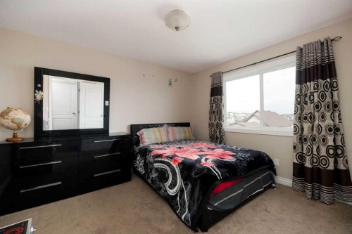 225 Sparrow Hawk Drive, Fort Mcmurray, AB - Indoor Photo Showing Bedroom