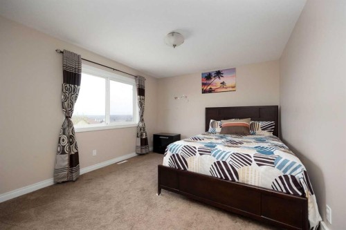 225 Sparrow Hawk Drive, Fort Mcmurray, AB - Indoor Photo Showing Bedroom
