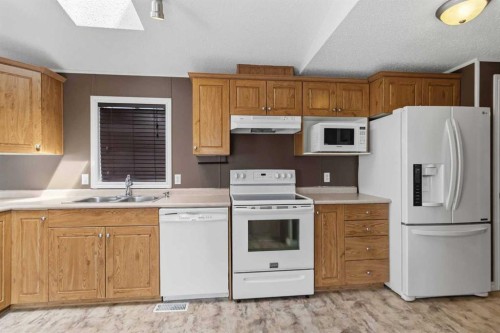 192 Mitchell Drive, Fort Mcmurray, AB - Indoor Photo Showing Kitchen With Double Sink