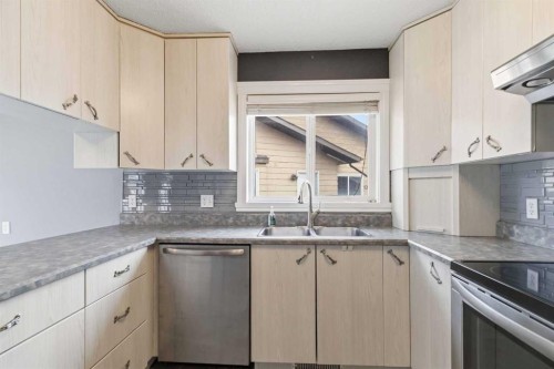 233 Gladstone Bay, Fort Mcmurray, AB - Indoor Photo Showing Kitchen With Double Sink