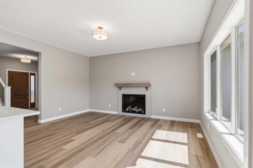 241 Warren Way, Fort Mcmurray, AB - Indoor Photo Showing Living Room With Fireplace