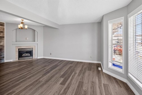108 Kodiak Crescent, Fort Mcmurray, AB - Indoor Photo Showing Living Room With Fireplace